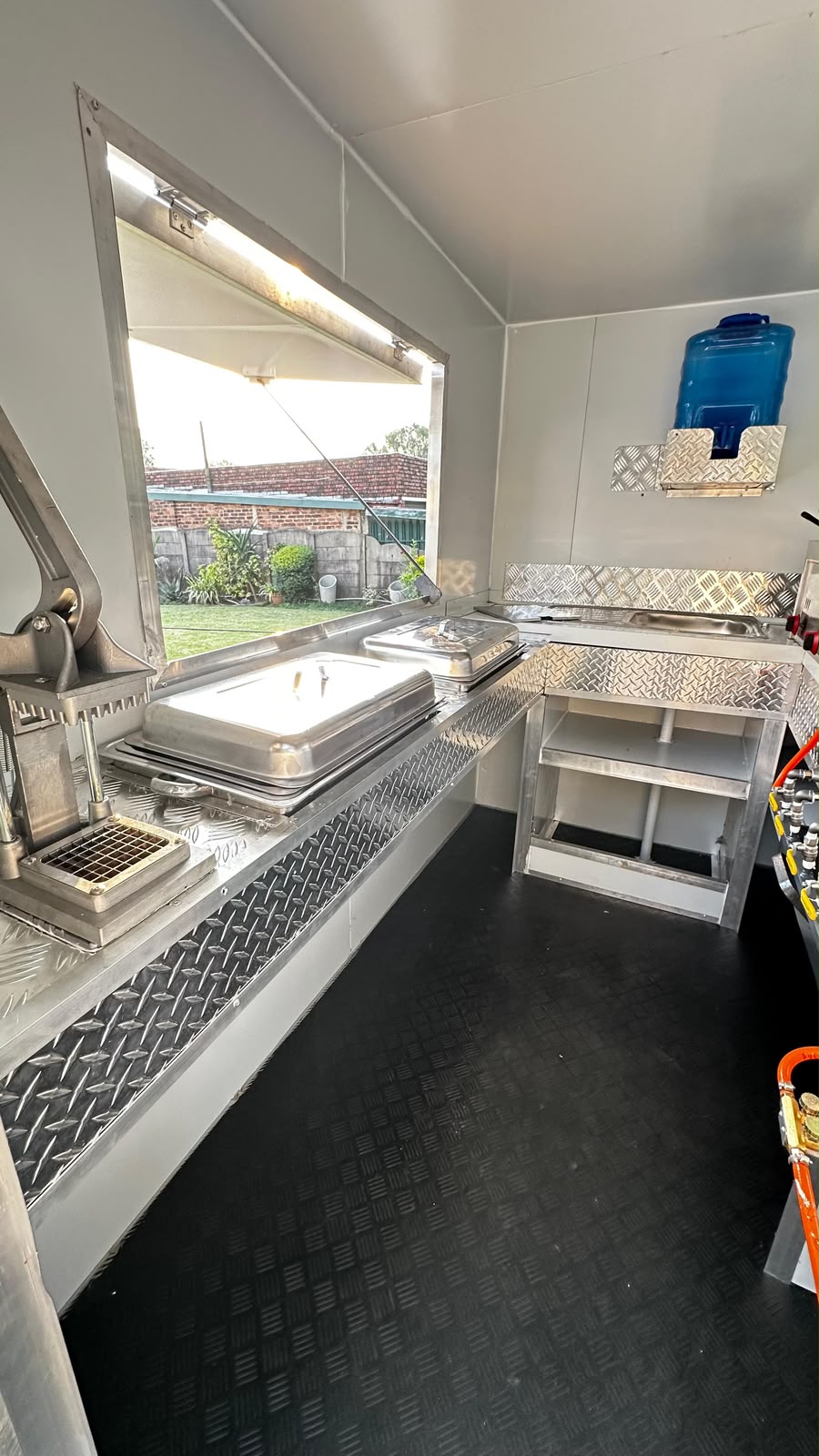 Ndlela Projects Mobile Kitchen — Preparation counter and serving window