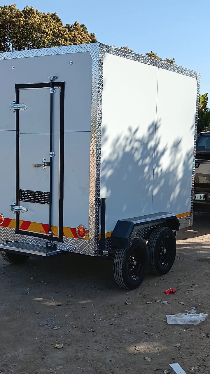 Ndlela Projects Mobile Fridge — Twin-axle cold room door