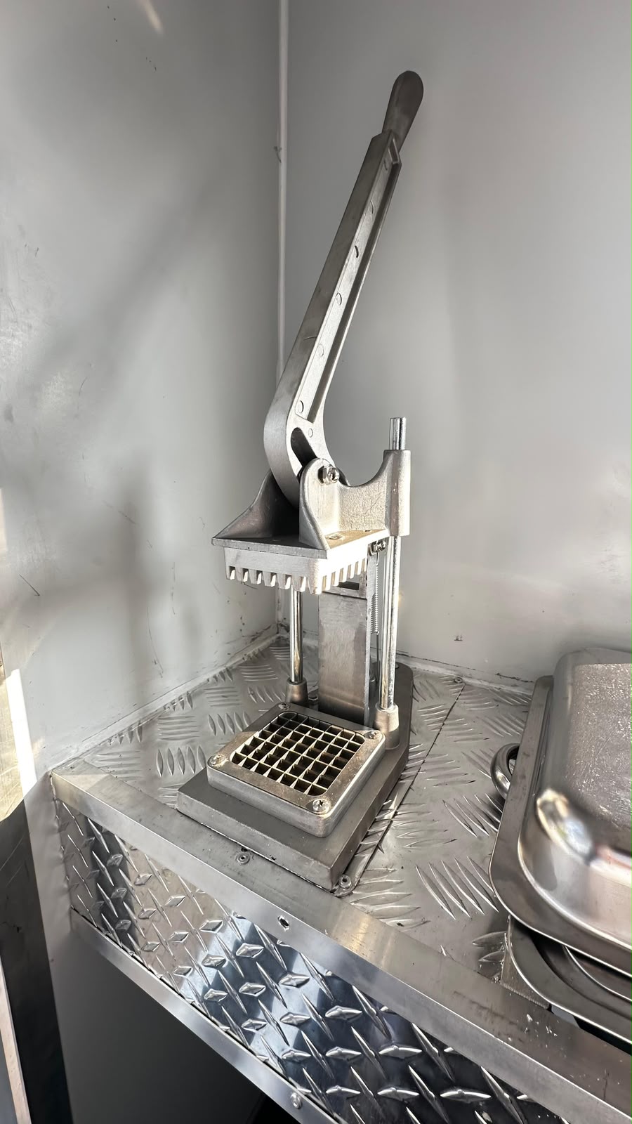 Ndlela Projects Mobile Kitchen — Chip cutter prep station